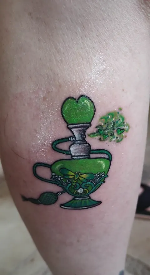 Green potion bottle with a heart stopper, in color