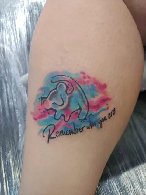 Watercolor lion cub outline with the words Remember who you are