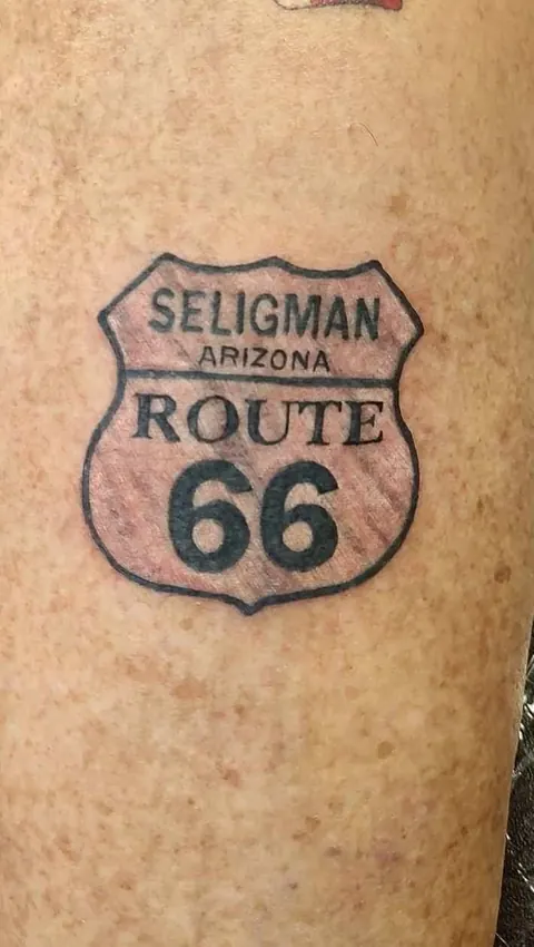 Route 66 shield reading Seligman, Arizona